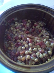 The onion-tomato-chickpea-apricot mixture in the crockpot before adding in the lamb